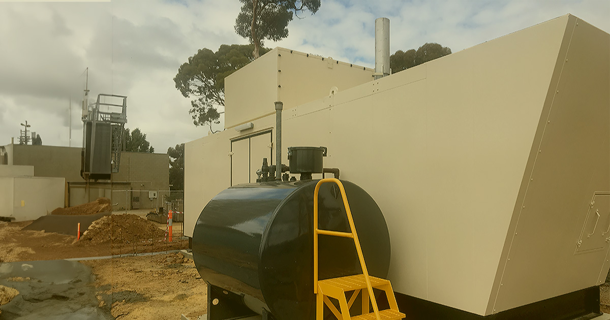 Large storage tank with ladder at Merredin SES, supporting critical power systems for reliable energy storage and distribution