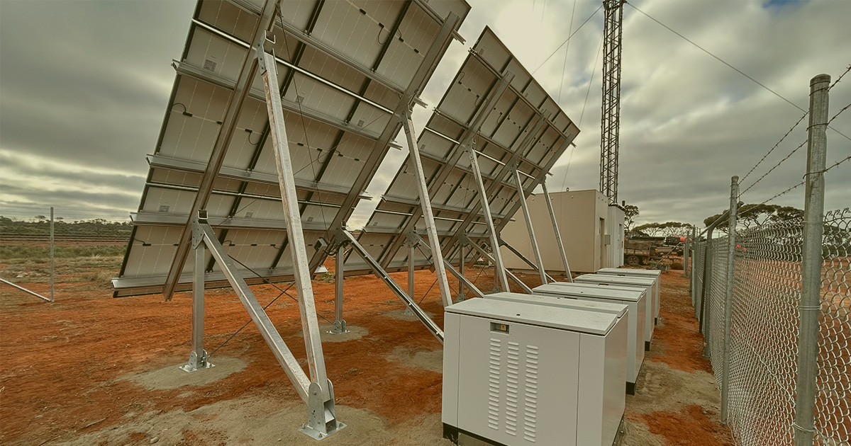 Off grid solar hybrid system with fenced solar array and protective enclosure for Aerial view of Australian Rail Remote Telecommunication Link Upgrades.