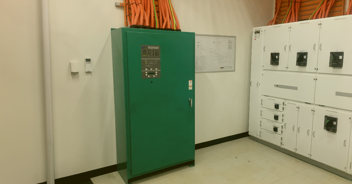 Green electrical cabinet with equipment and wiring for critical power systems management at Merredin SES