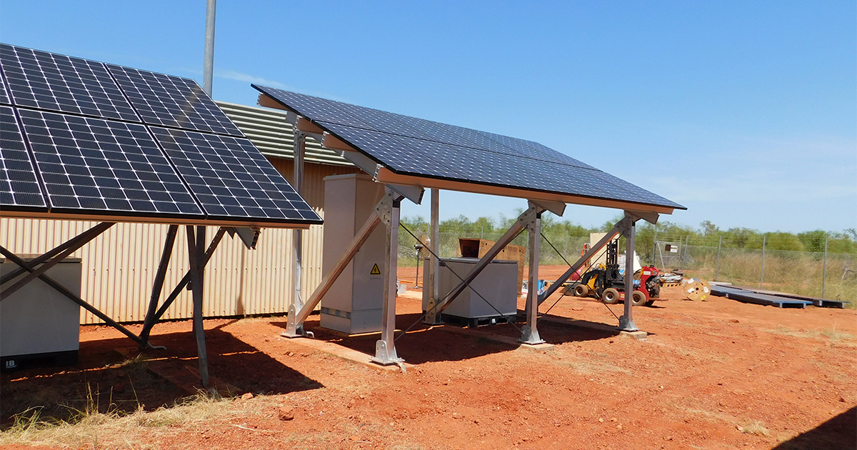 Off grid solar hybrid system with solar panels and utility pole supporting remote power across SA, WA and NT.