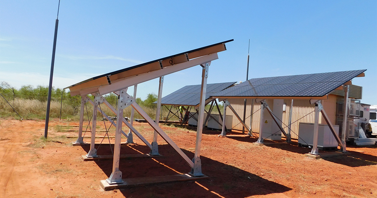 Off grid solar hybrid system with solar panels and utility pole supporting remote power across SA, WA and NT.